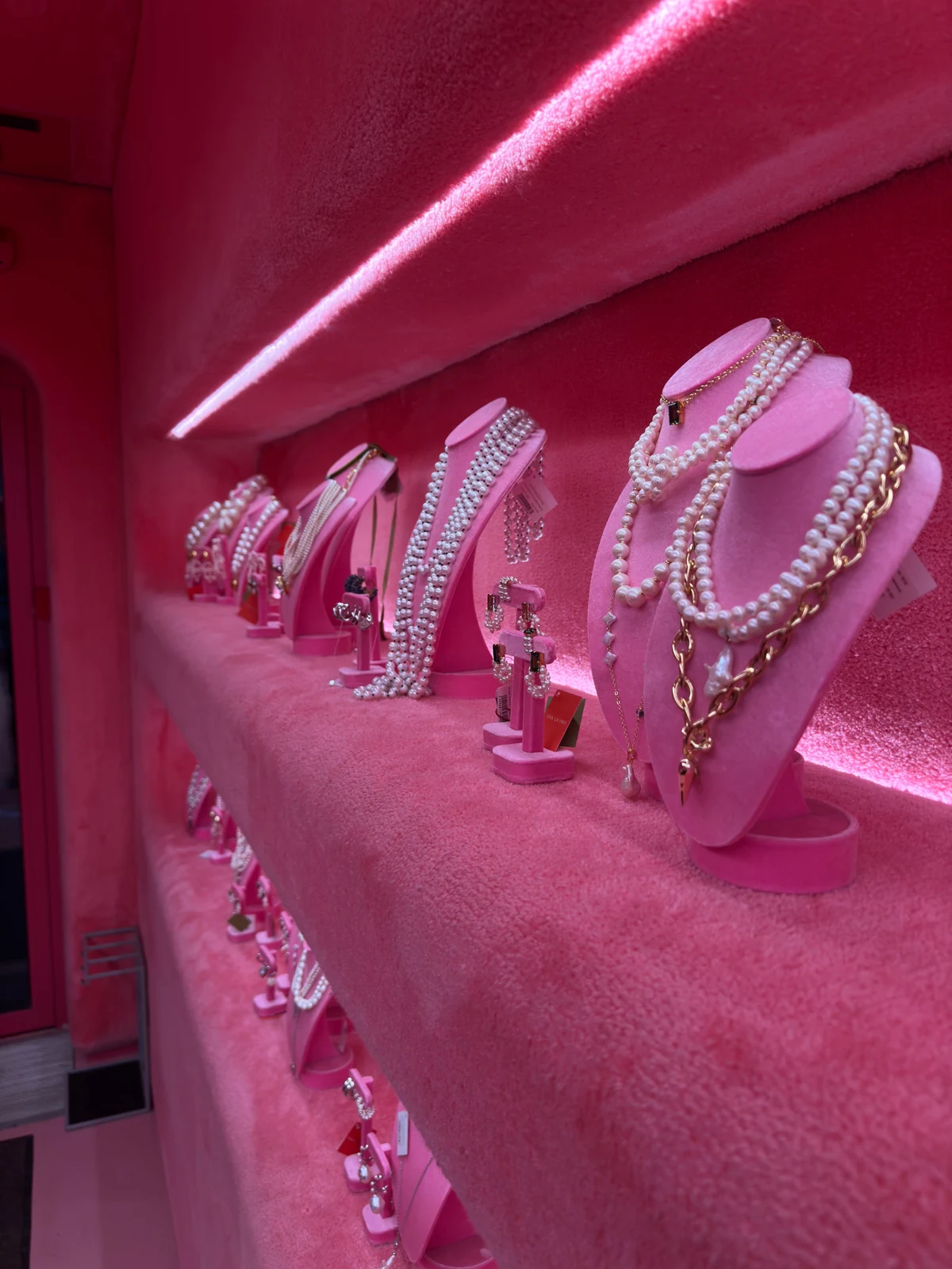 Jewelry stands arranged in a retail display
